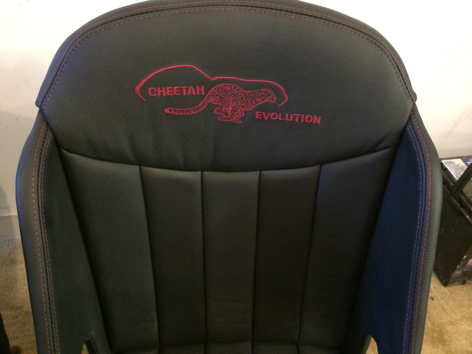race seat cover with cheetah evolution logo